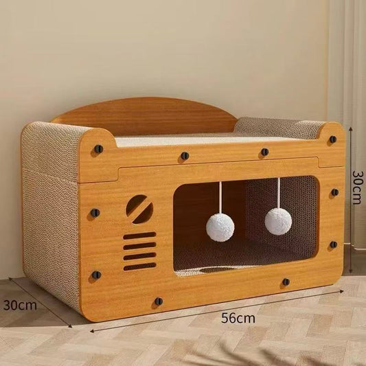 Wooden cat litter box enclosure with ventilation slats, hanging pom-pom toys, and textured sides, measuring 56x30x30 cm.