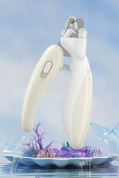 White handheld nail clipper with ergonomic handle displayed on a decorative plate with purple coral and sea elements
