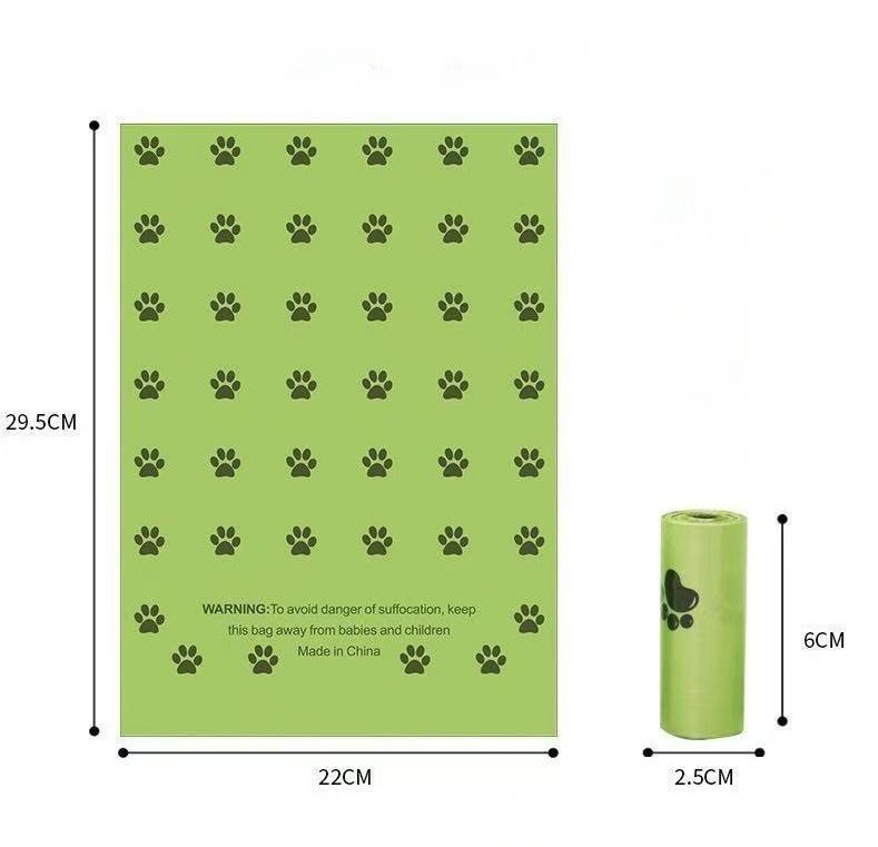 Green dog poop bags with black paw prints, dimensions 29.5x22cm, and a 6cm roll size